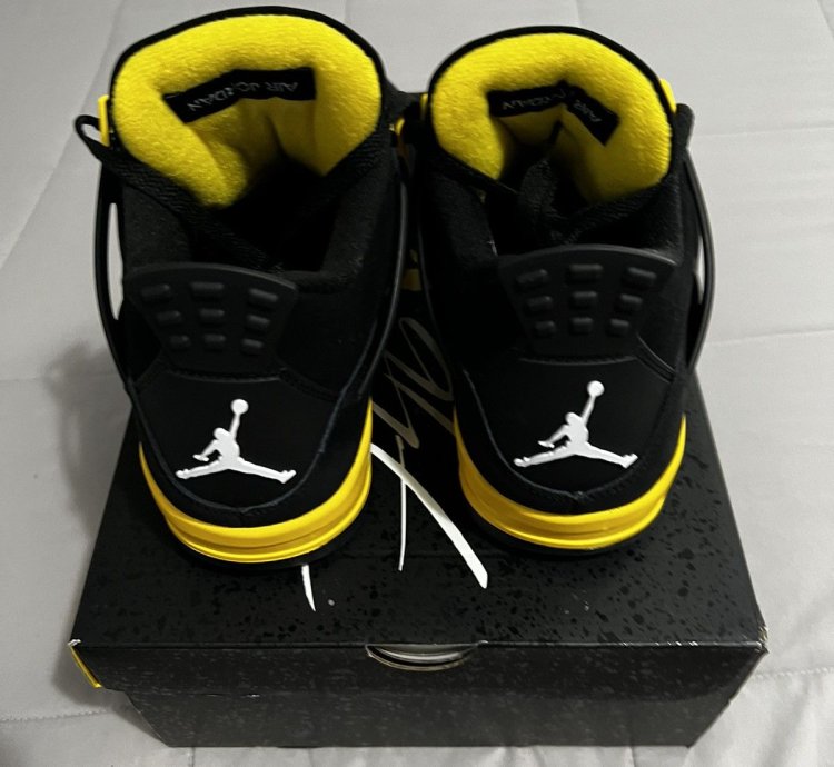 Jordan 4 Black and Yellow