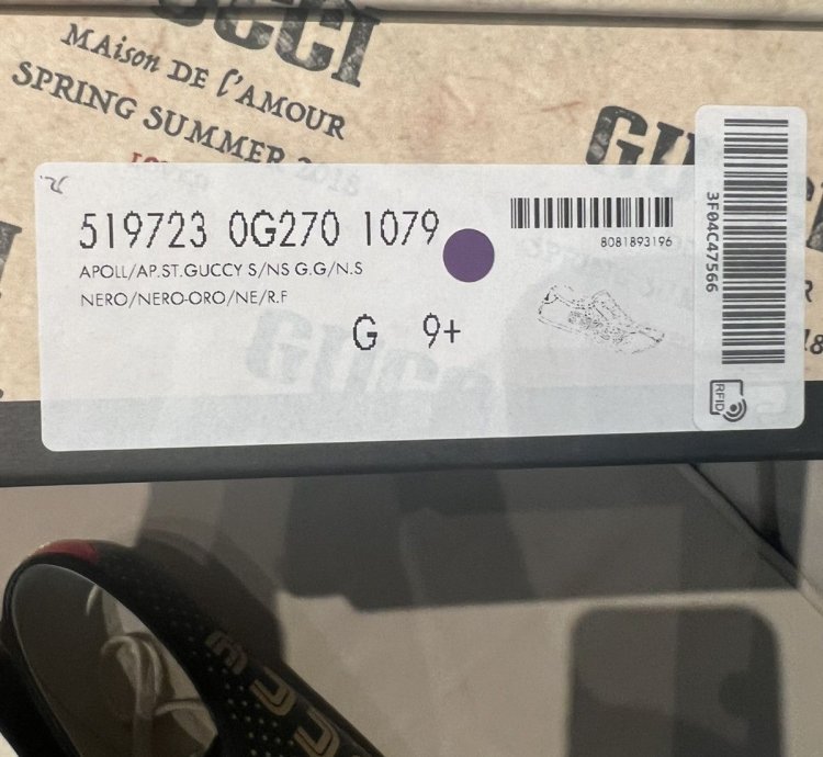 Gucci black gold star sneaker