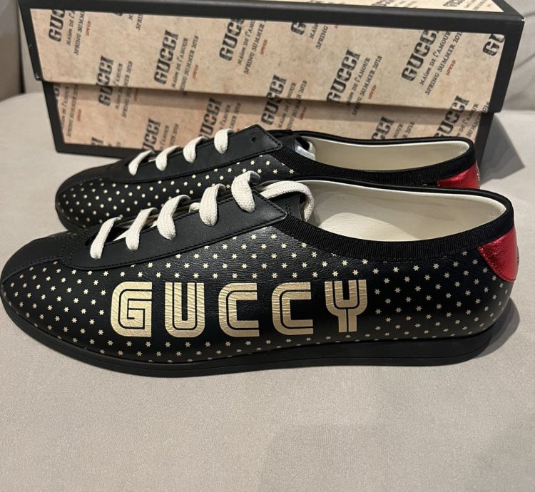 Gucci black gold star sneaker