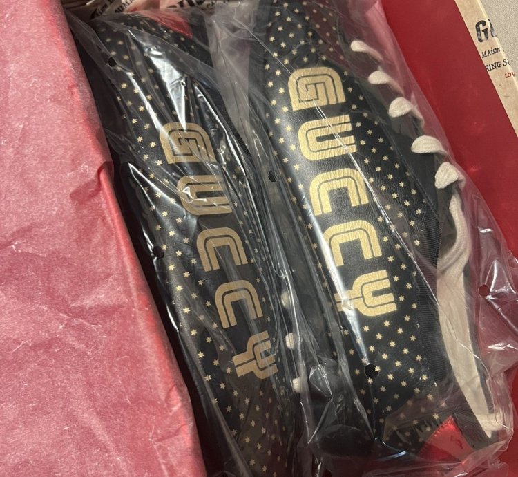 Gucci black gold star sneaker