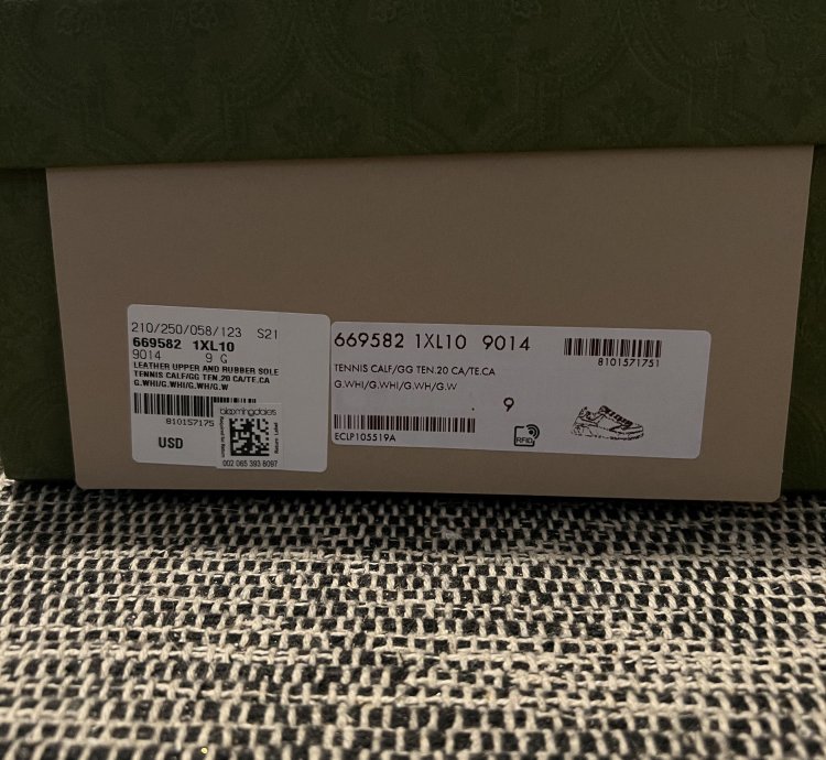 Gucci GG Embossed Sneakers in White