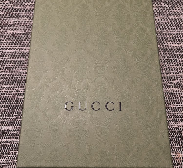 Gucci GG Embossed Sneakers in White