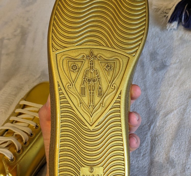 Gucci gold aces