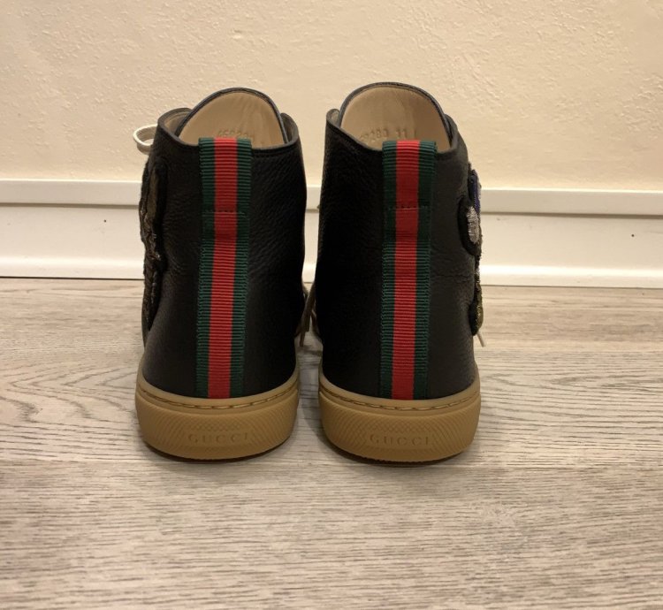 Leather High Donald Duck sneakers by Gucci