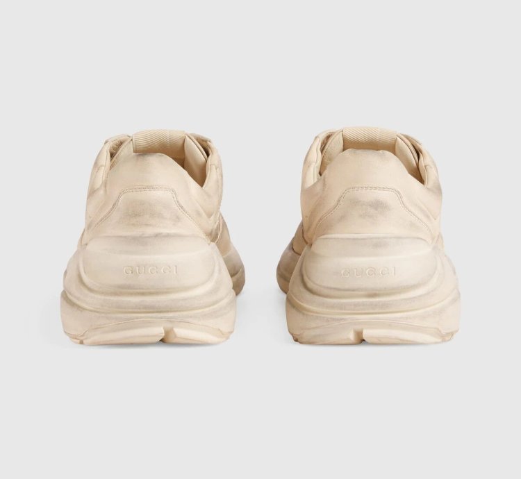 o1s1wg110125 Rhyton Leather Low-Top Sneakers in Beige