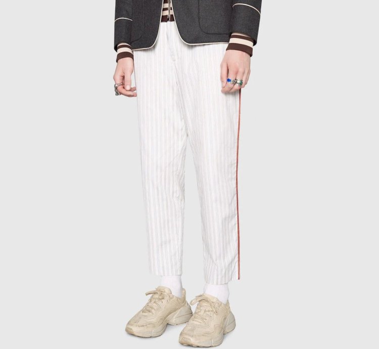 o1s1wg110125 Rhyton Leather Low-Top Sneakers in Beige