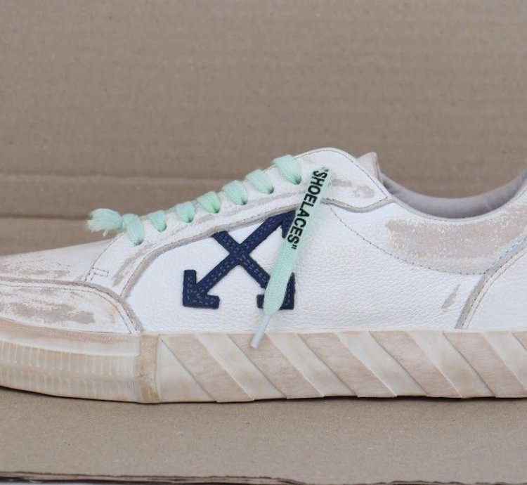 Low Vulcanized Distressed Sneakers In White Navy Blue