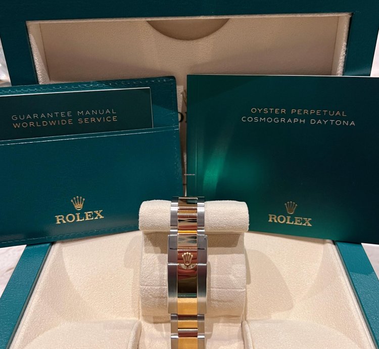 Rolex Daytona Champagne Dial Yellow Gold Steel