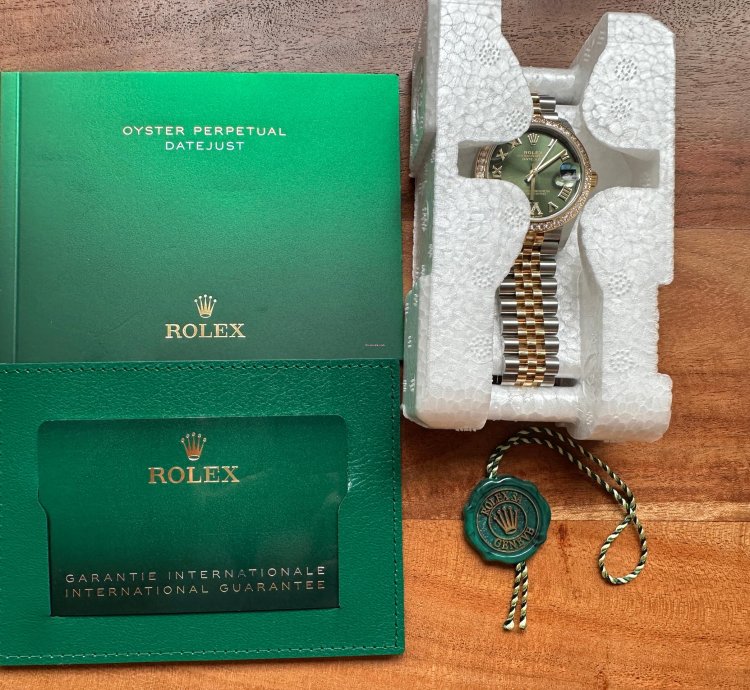 Rolex Datejust 31 2023 Two Tone Yellow Gold Green Roman Dial Diamond Bezel - Jubilee Bracelet