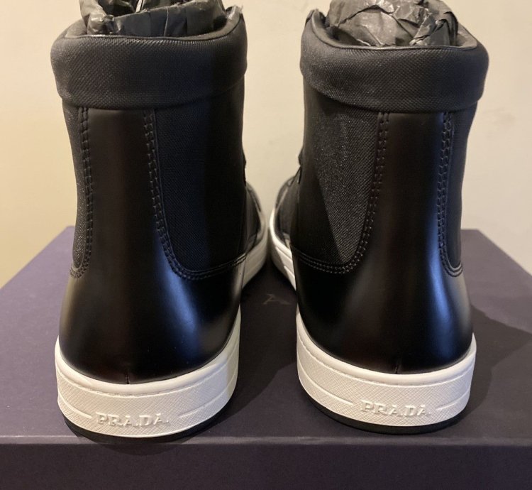 Prada High Top Leather And Nylon Sneakers