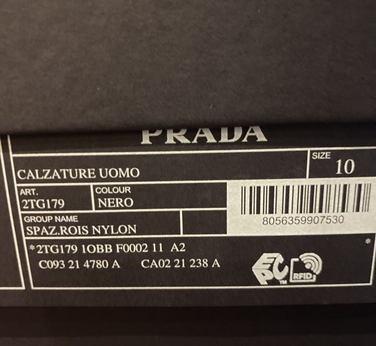 Prada High Top Leather And Nylon Sneakers