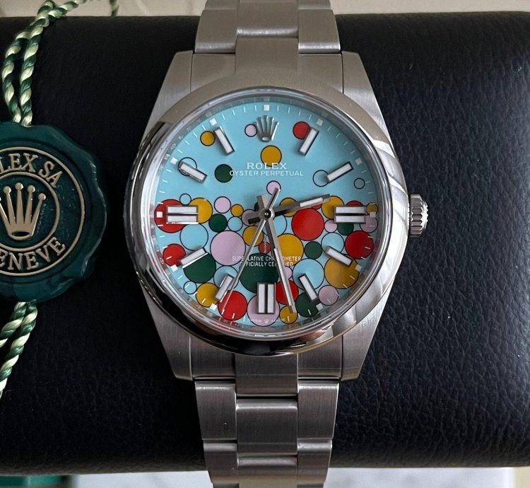Rolex Oyster Perpetual 41 Bubble Celebration Dial New