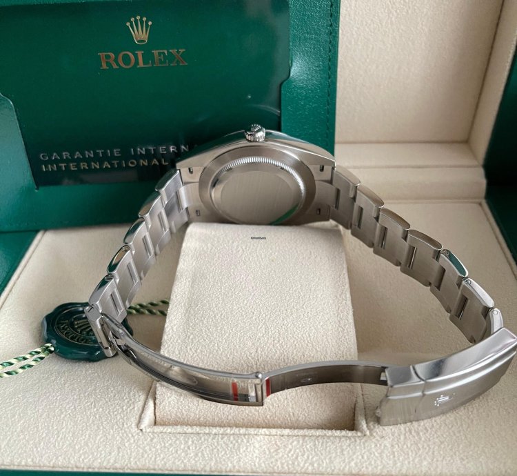 Rolex Oyster Perpetual 41 Bubble Celebration Dial New