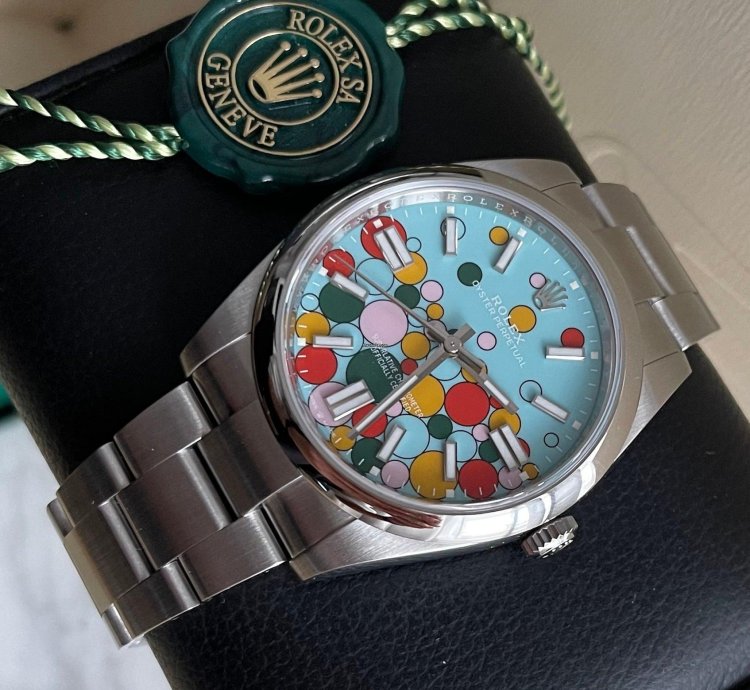 Rolex Oyster Perpetual 41 Bubble Celebration Dial New