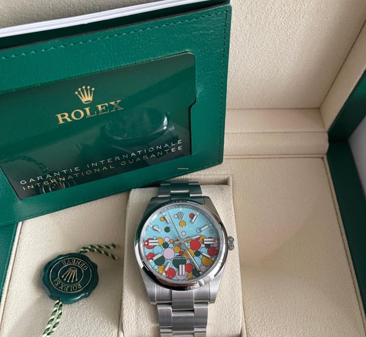 Rolex Oyster Perpetual 41 Bubble Celebration Dial New