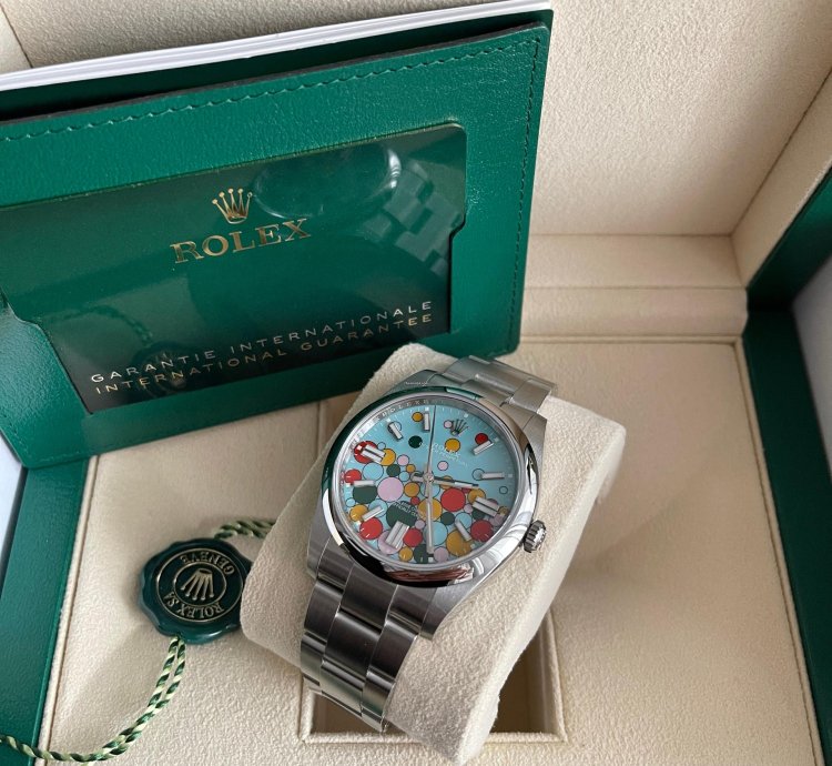 Rolex Oyster Perpetual 41 Bubble Celebration Dial New