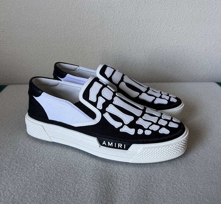 Amiri Skel Top Slip Ons In White Black