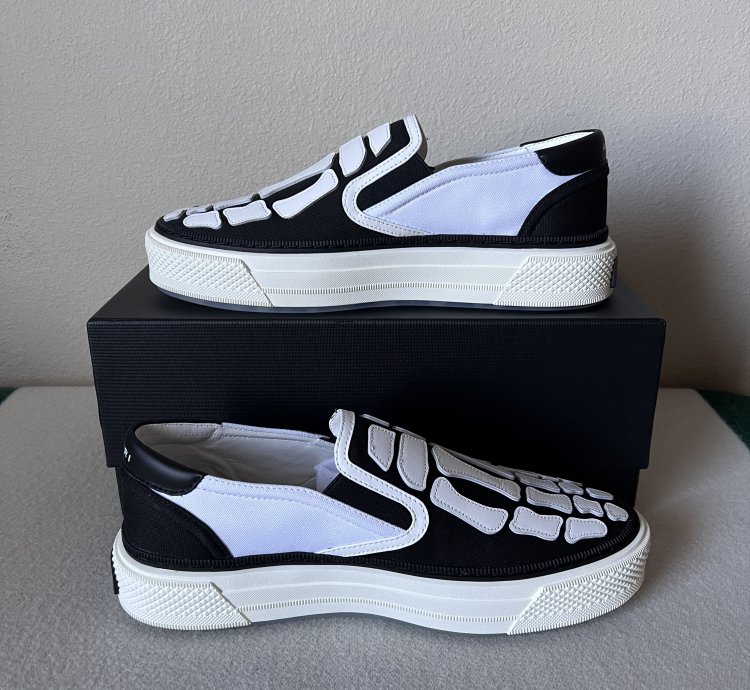 Amiri Skel Top Slip Ons In White Black