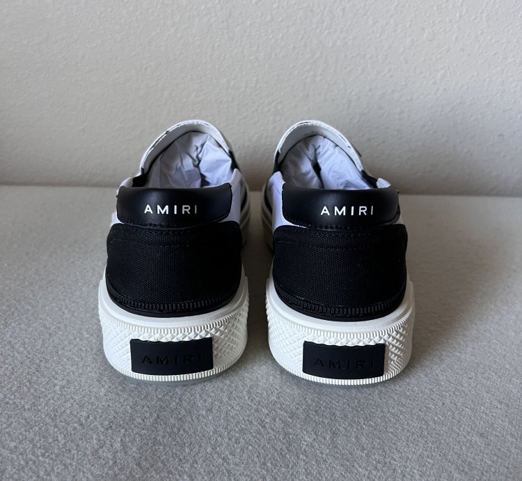 Amiri Skel Top Slip Ons In White Black