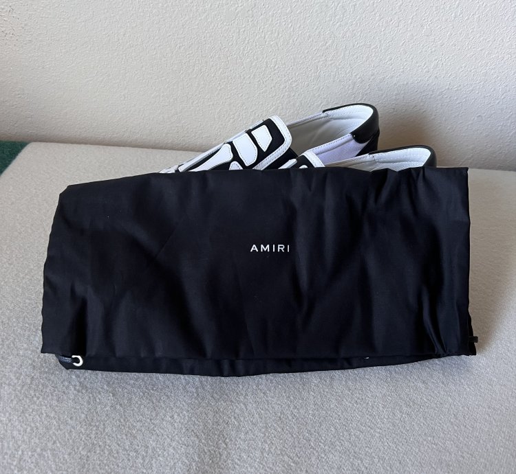 Amiri Skel Top Slip Ons In White Black