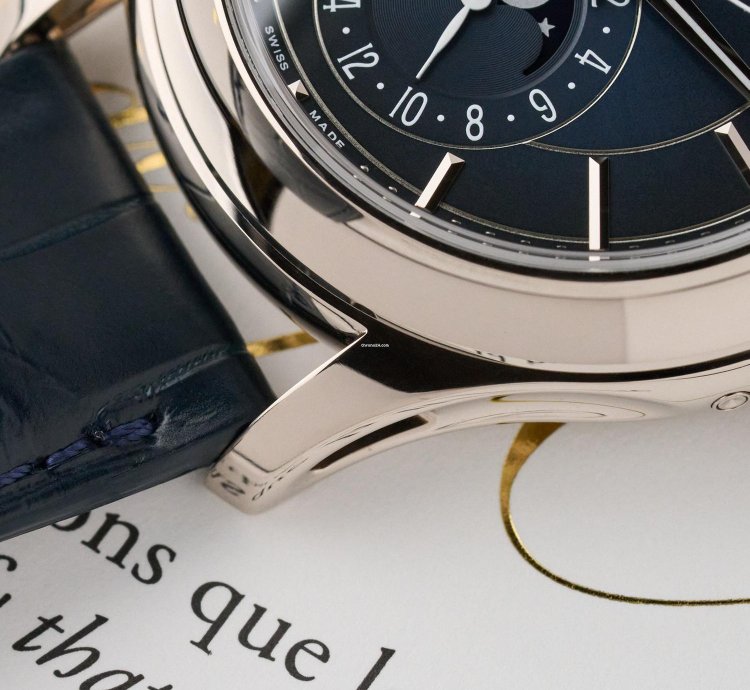 Patek Philippe Annual Calendar 5205g - 18k White Gold - Blue Dial - Full Set - Like New