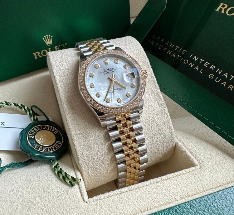 Rolex Datejust 31 2023 Two Tone Yellow Gold Mother Of Pearl Dial Fluted Bezel Jubilee Bracelet