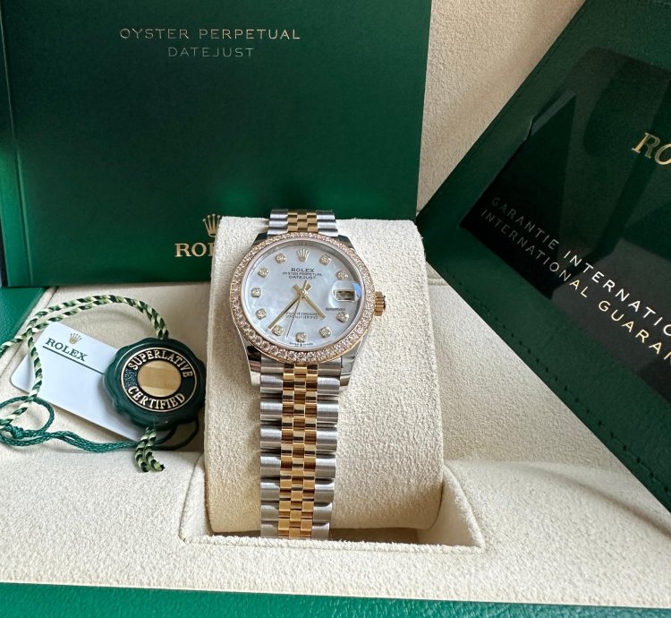 Rolex Datejust 31 2023 Two Tone Yellow Gold Mother Of Pearl Dial Fluted Bezel Jubilee Bracelet