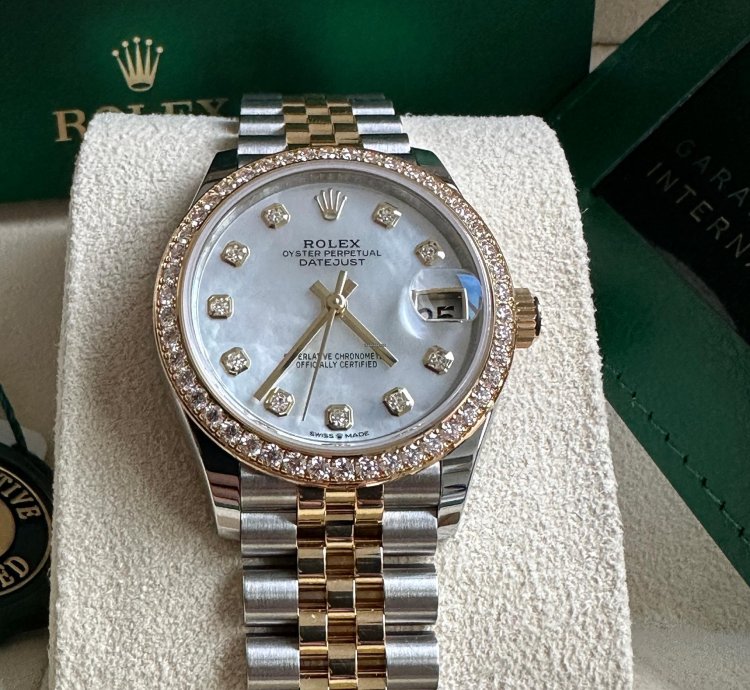 Rolex Datejust 31 2023 Two Tone Yellow Gold Mother Of Pearl Dial Fluted Bezel Jubilee Bracelet