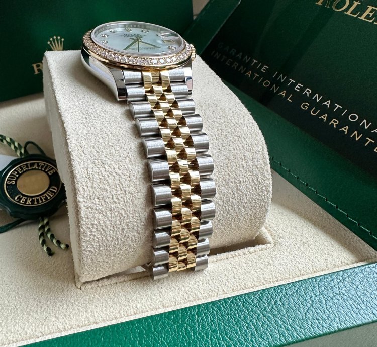 Rolex Datejust 31 2023 Two Tone Yellow Gold Mother Of Pearl Dial Fluted Bezel Jubilee Bracelet