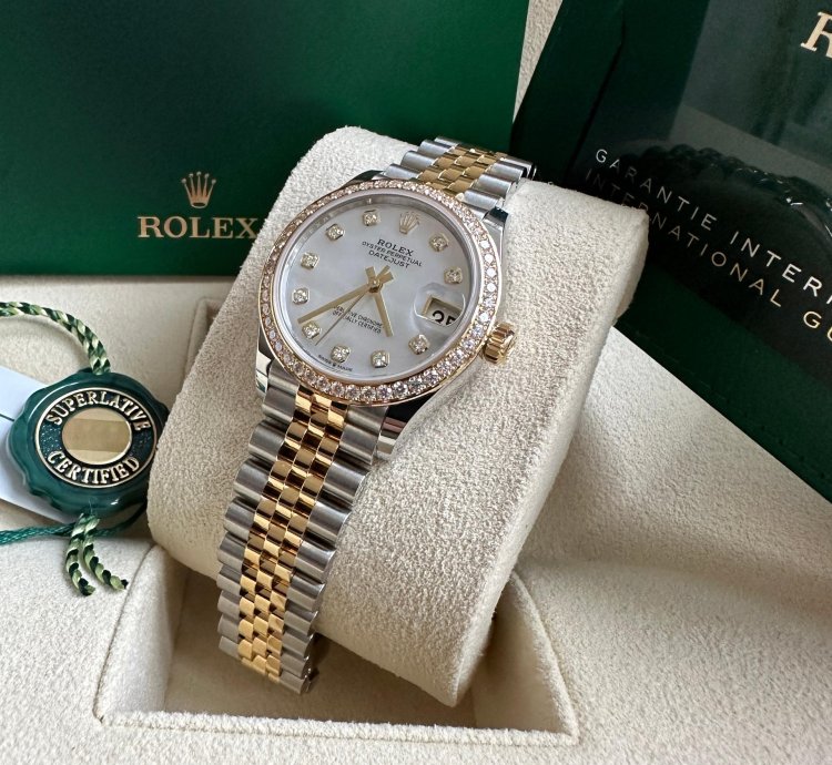 Rolex Datejust 31 2023 Two Tone Yellow Gold Mother Of Pearl Dial Fluted Bezel Jubilee Bracelet