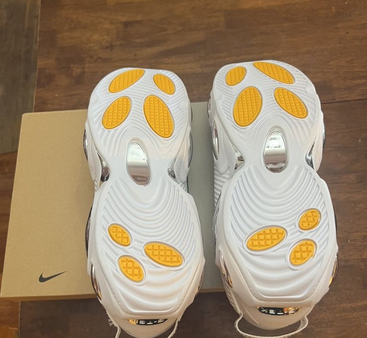Nike Nocta Glide Triple White Drake White Chrome Sneaker