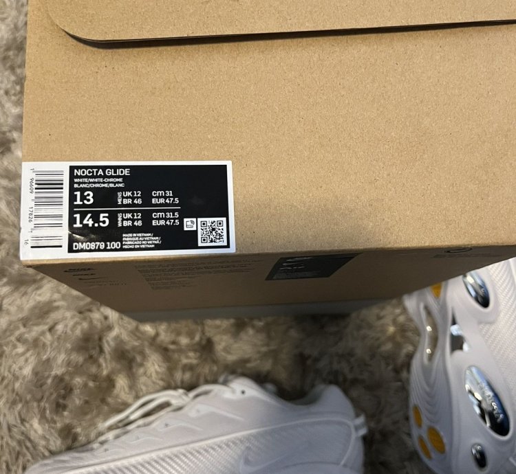 Nike Nocta Glide Triple White Drake White Chrome Sneaker