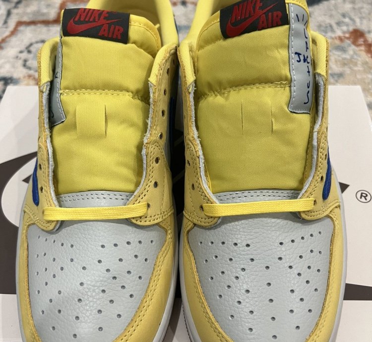 Travis Scott Jordan 1 Low Canary