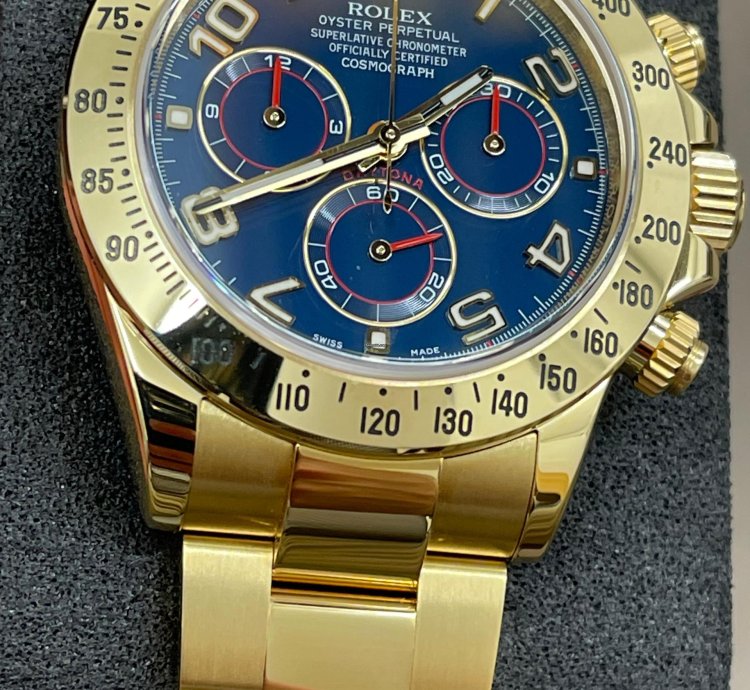 Rolex Daytona 116528 - Blue Dial - Yellow Gold - 2014 - Unworn