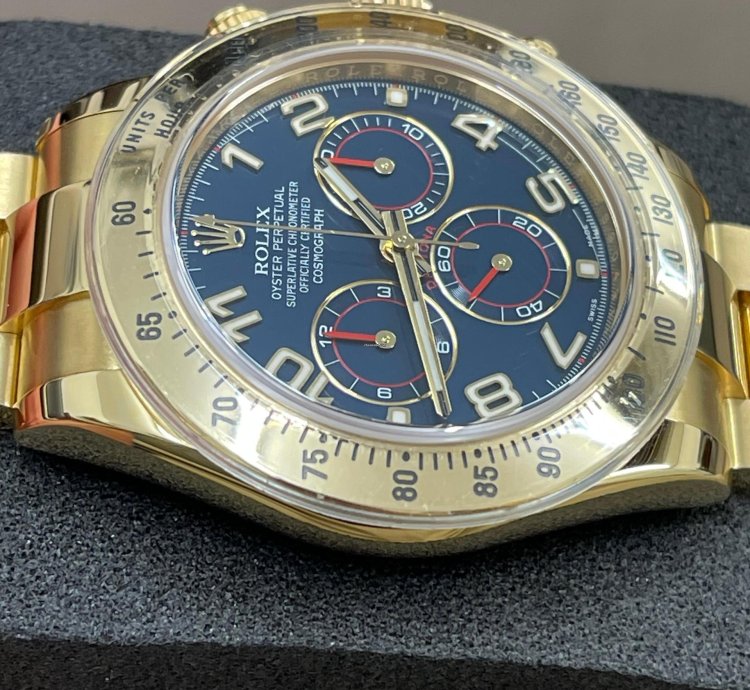 Rolex Daytona 116528 - Blue Dial - Yellow Gold - 2014 - Unworn