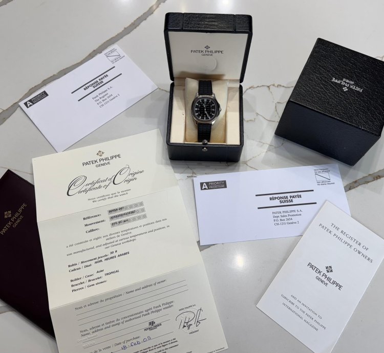 Patek Philippe Aquanaut One Owner Barely Used With Original Papers And Box