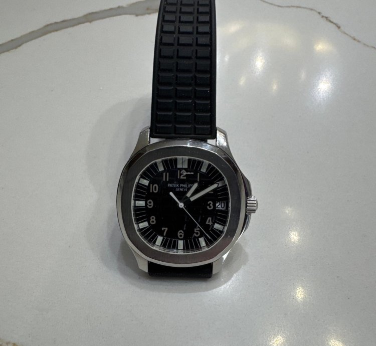 Patek Philippe Aquanaut One Owner Barely Used With Original Papers And Box