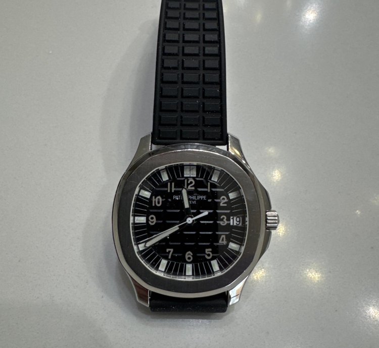 Patek Philippe Aquanaut One Owner Barely Used With Original Papers And Box
