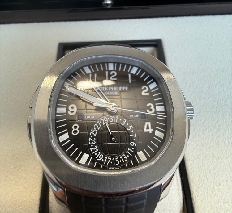 Patek Philippe Aquanaut Travel Time Box Papiere