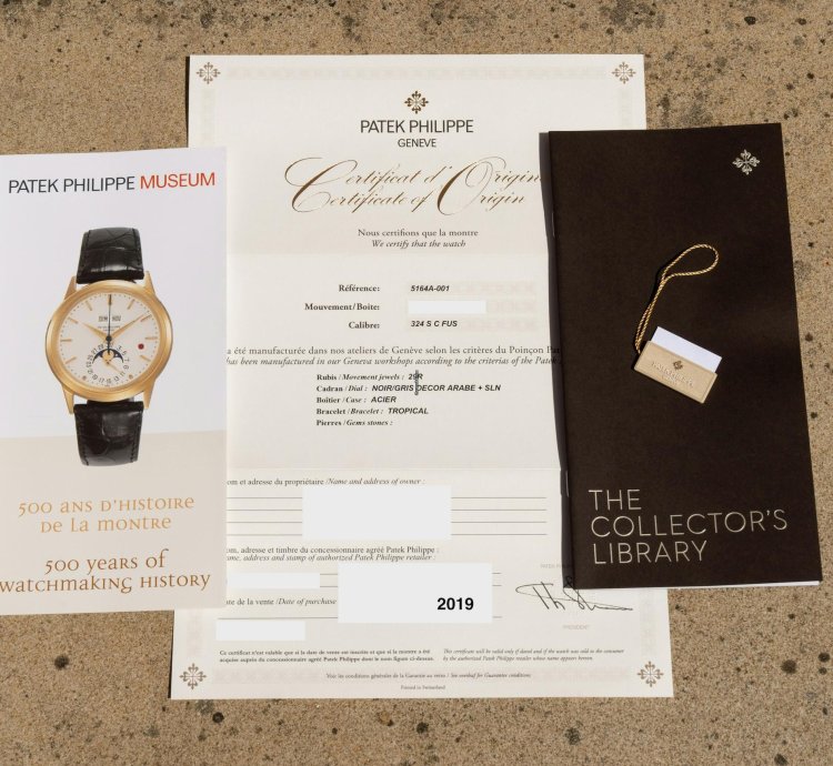 Patek Philippe Aquanaut Travel Time Full Set 2019 Very Good Condition