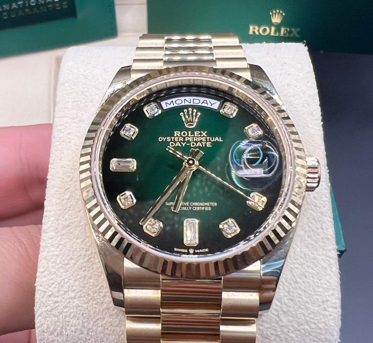 Rolex Day-date 36 Green Baguette Dial Yellow Gold 36mm
