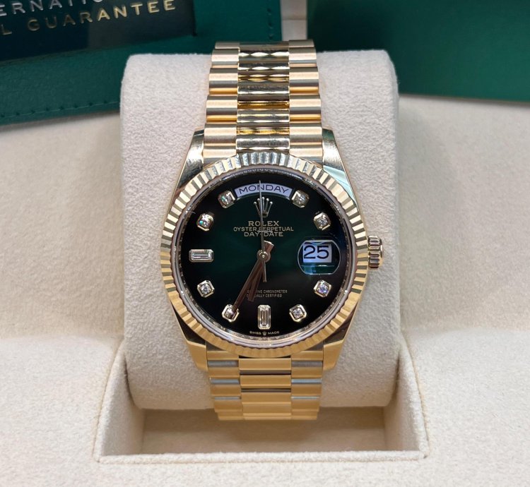Rolex Day-date 36 Green Baguette Dial Yellow Gold 36mm
