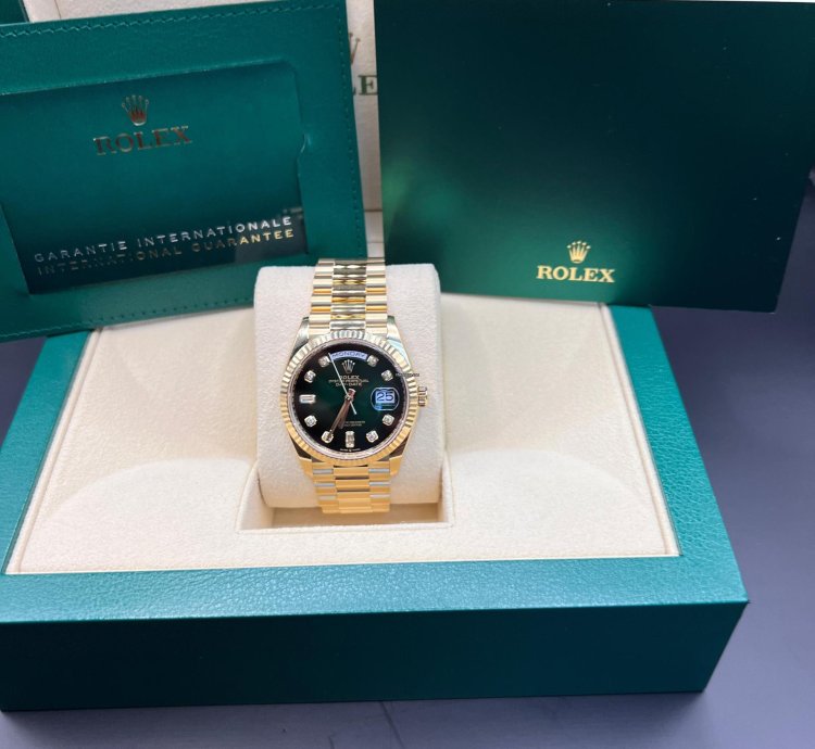 Rolex Day-date 36 Green Baguette Dial Yellow Gold 36mm