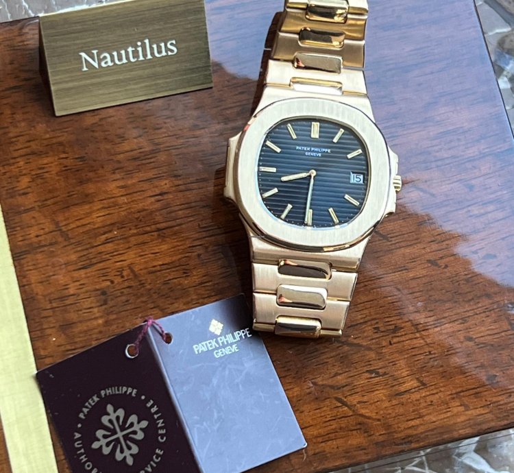 Patek Philippe Nautilus 3700 1 Nautilus Jumbo Gelbgold Tritium Zifferblatt Box Stammbuchauszug