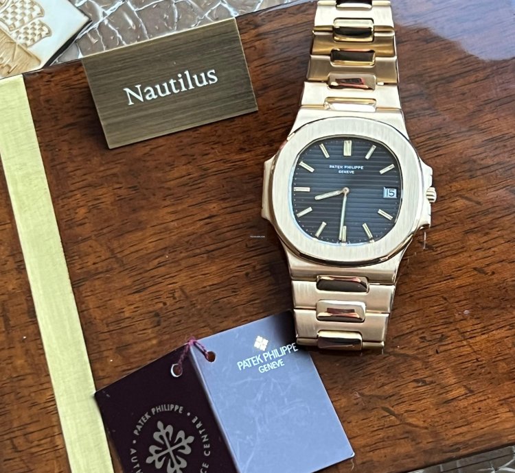 Patek Philippe Nautilus 3700 1 Nautilus Jumbo Gelbgold Tritium Zifferblatt Box Stammbuchauszug