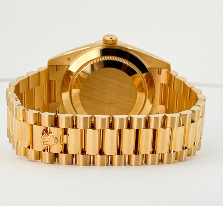 Rolex Day-date 40 40mm Fluted Bezel Yellow Gold Champagne Baguette Diamond Dial Presidential Band