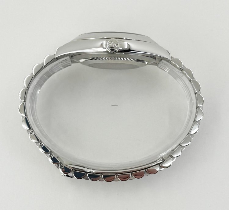 Rolex Day-date 40 40mm Smooth Bezel Platinum Ice Blue Roman Dial Presidential Band 228206