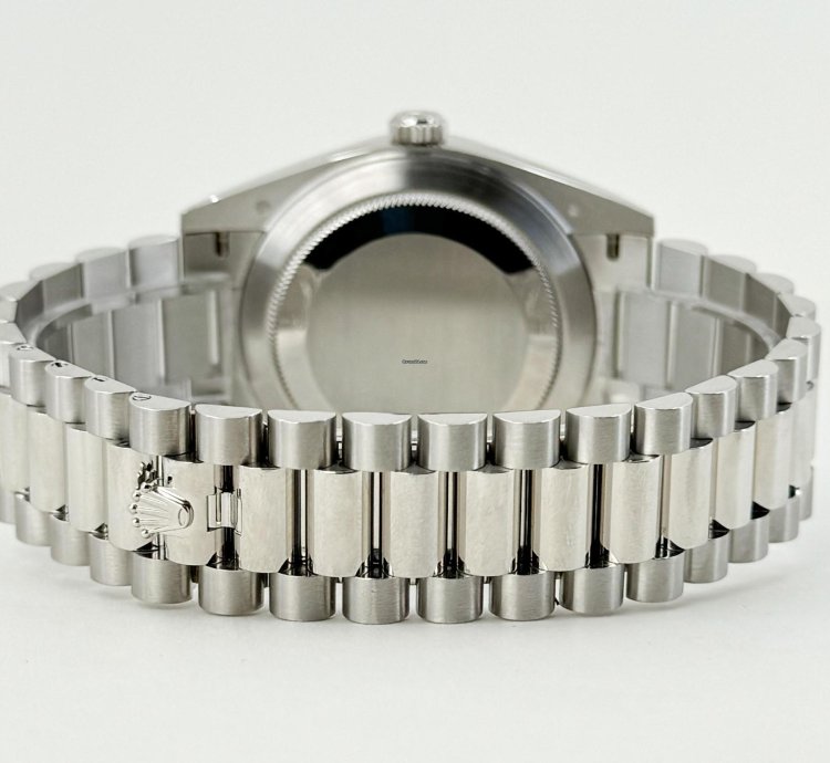 Rolex Day-date 40 40mm Smooth Bezel Platinum Ice Blue Roman Dial Presidential Band 228206