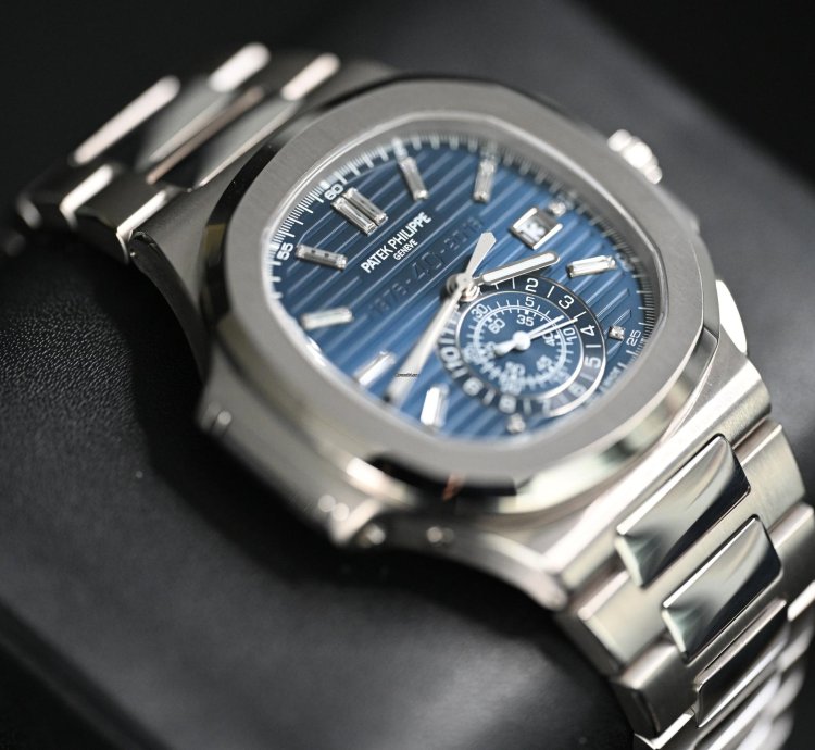 Patek Philippe Nautilus 5976 1g Chronograph 40th Anniversary White Gold Blue Dial Baguette Markers 44mm