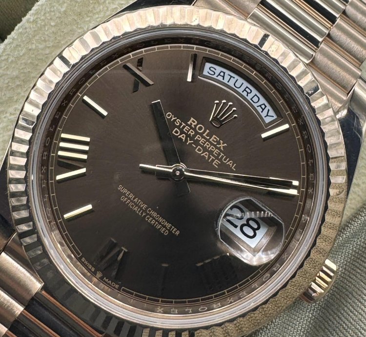 Rolex Day-date 40 Chocolate Roman Dial Unworn